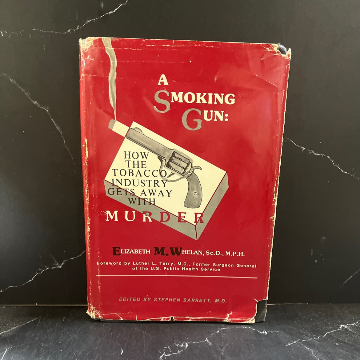 a smoking gun: how the tobacco industry gets away with murder book, by elizabeth m. whelan, 1984 Hardcover image 1