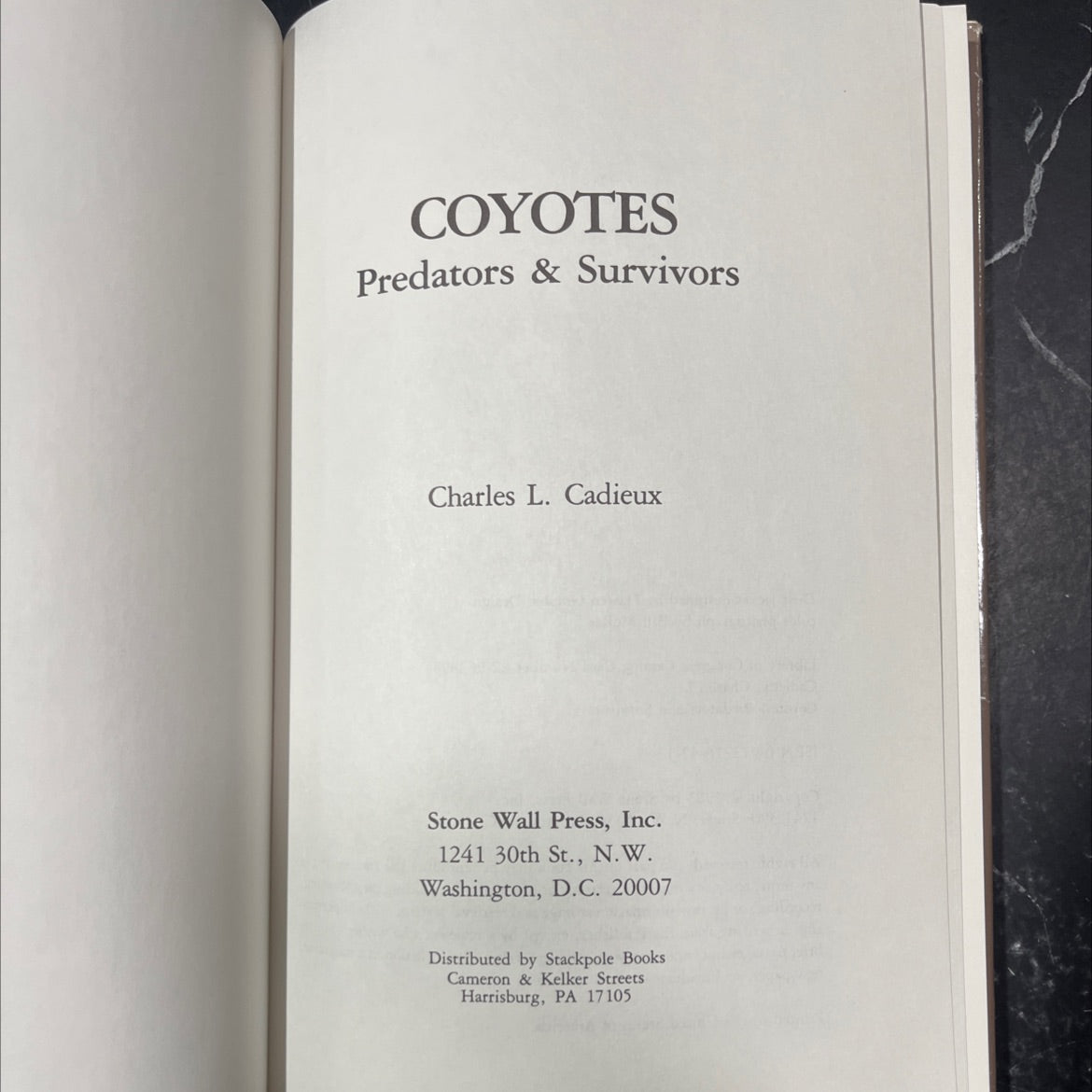 coyotes: predators and survivors book, by Charles L. Cadieux, 1983 Hardcover image 2