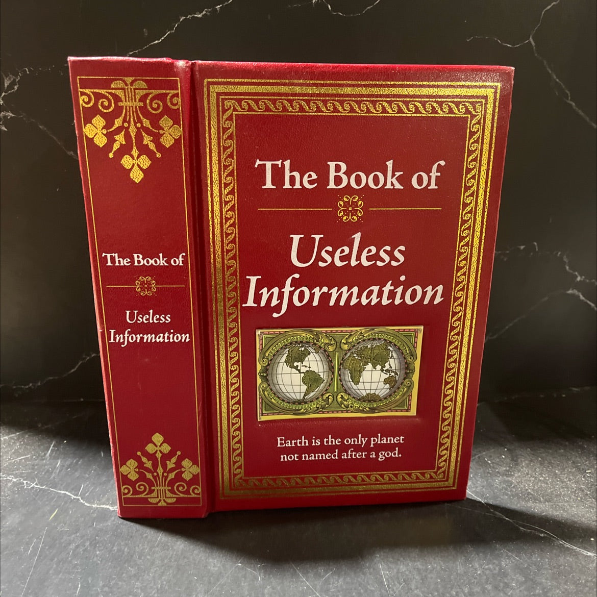 the book of useless information book, by unknown, 2011 Leather image 1