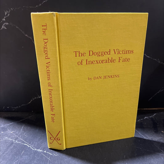 the dogged victims of inexorable fate book, by Dan Jenkins, 1985 Hardcover image 1