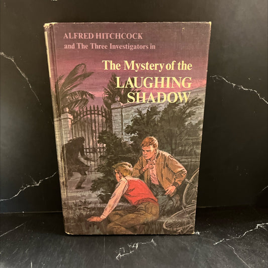 alfred hitchcock and the three investigators in the mystery of the laughing shadow book, by william arden, 1969 image 1