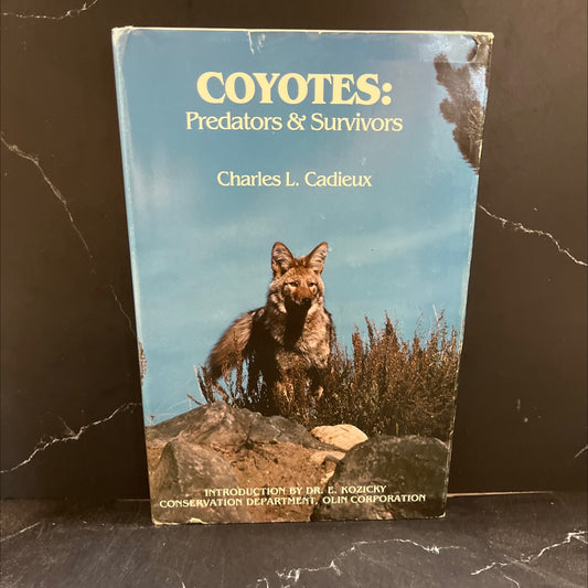 coyotes: predators and survivors book, by Charles L. Cadieux, 1983 Hardcover image 1