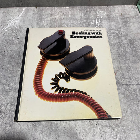 dealing with emergencies book, by unknown, 1981 Hardcover image 1