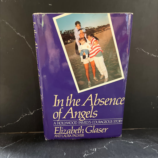 in the absence of angels a hollywood family's courageous story book, by Elizabeth Glaser and Laura Palmer, 1991 image 1