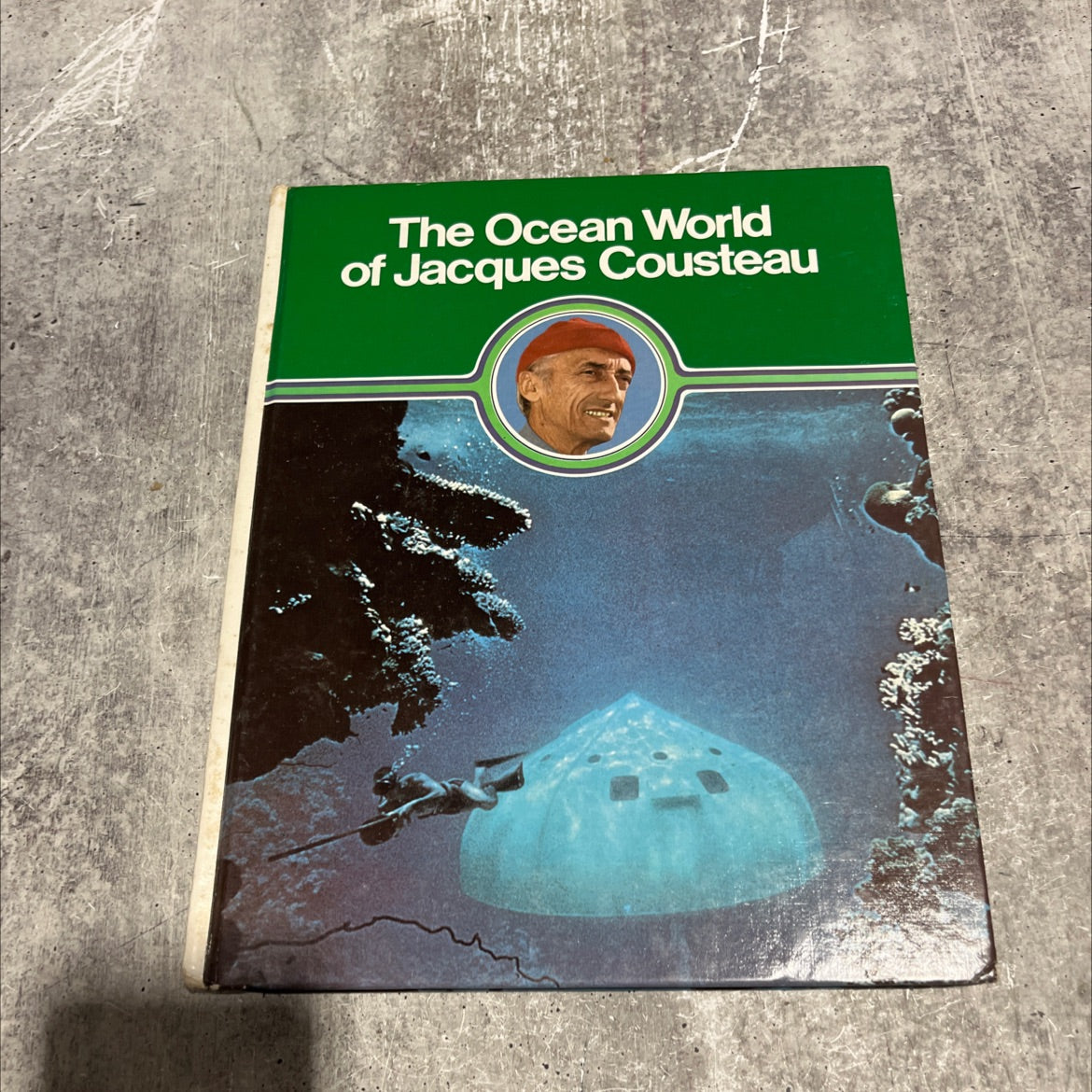 man re-enters the sea book, by Jacques Yves Cousteau, 1975 Hardcover image 1