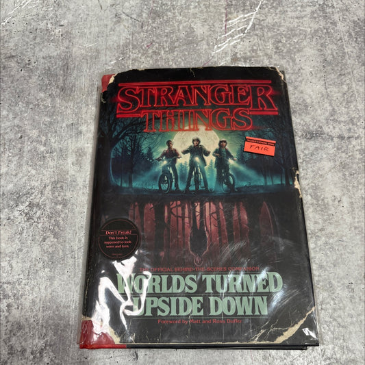 stranger things worlds turned upside down book, by gina mcintyre, 2018 Hardcover image 1