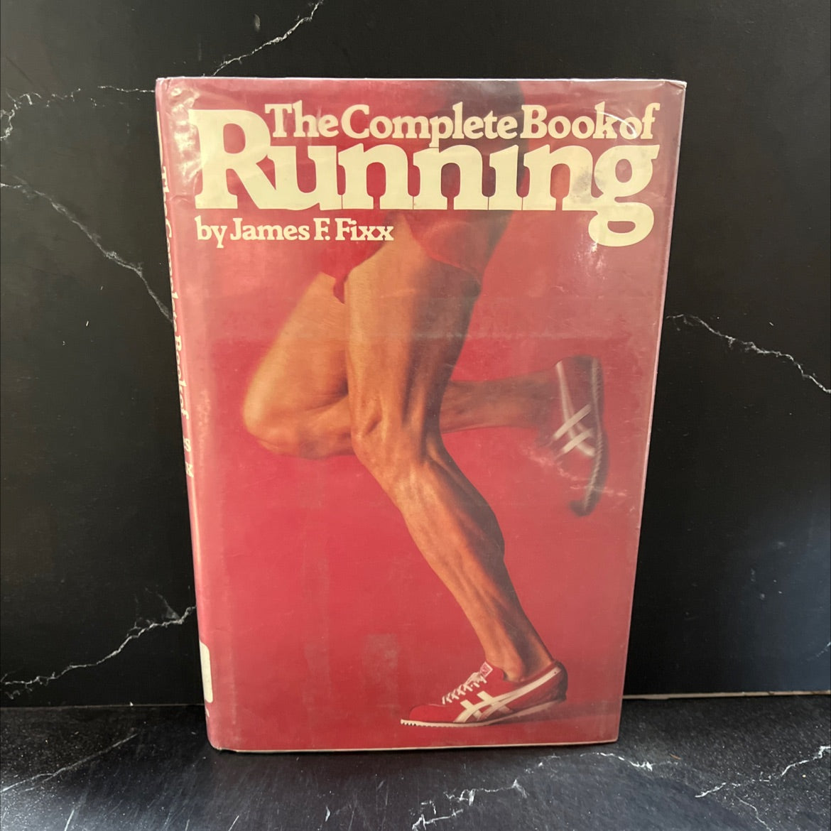 the complete book of running book, by james f. fixx, 1977 Hardcover image 1