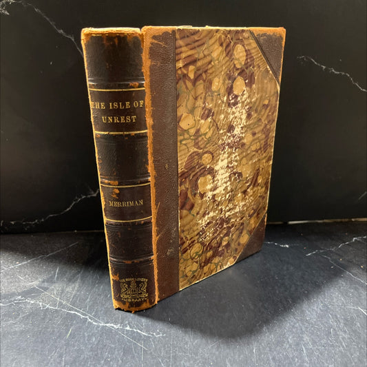 the isle of unrest book, by henry seton merriman, 1900 Leather image 1