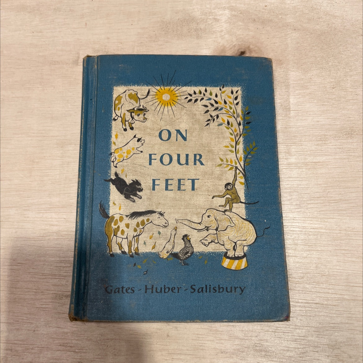 the macmillan readers on four feet book, by arthur i. gates, miriam blanton huber, frank seeley salisbury, 1957 image 1