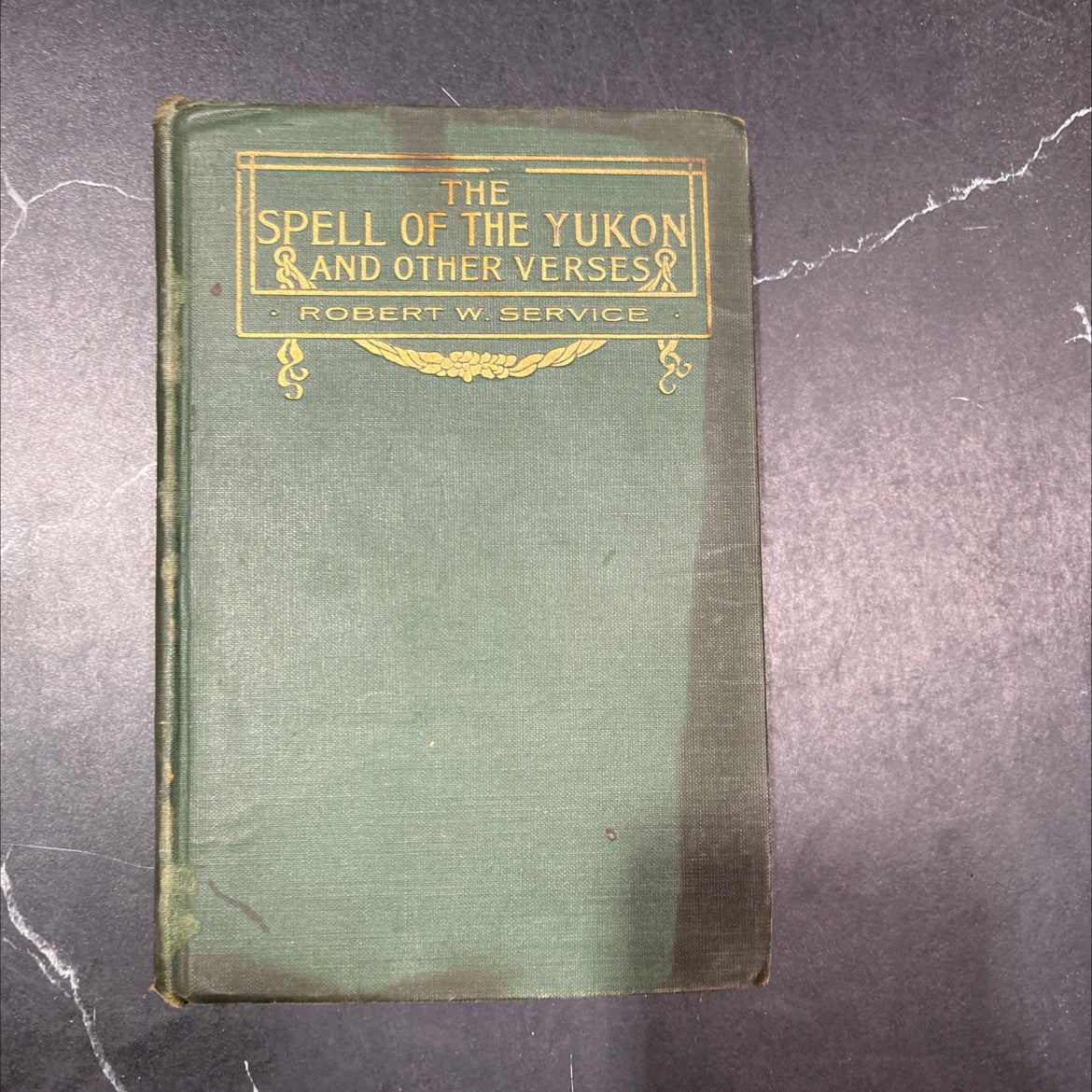 the spell of the yukon and other verses book, by robert w. service, 1907 Hardcover image 1