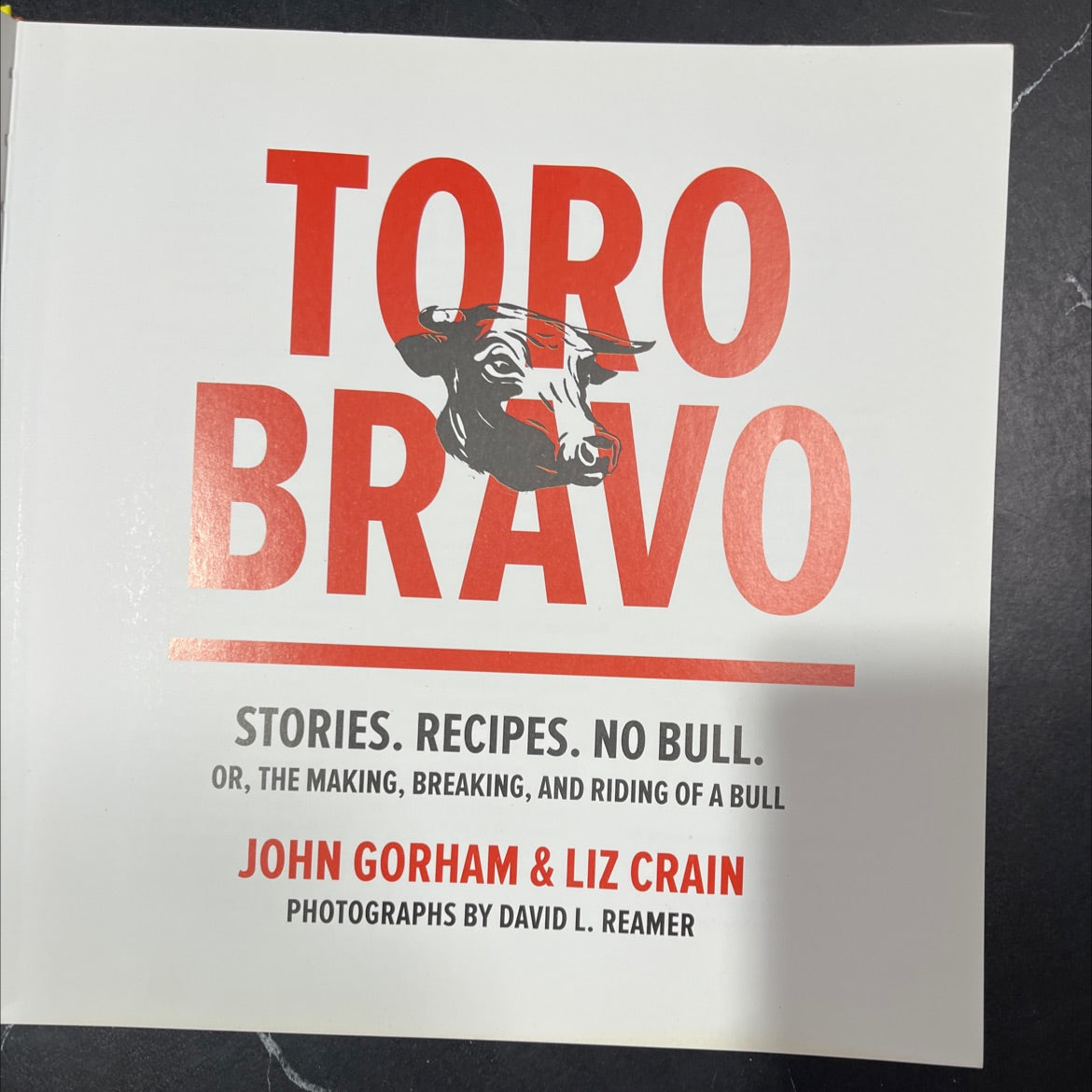 toro bravo stories. recipes. no bull. or, the making, breaking, and riding of a bull book, by John Gorham & Liz Crain, image 2